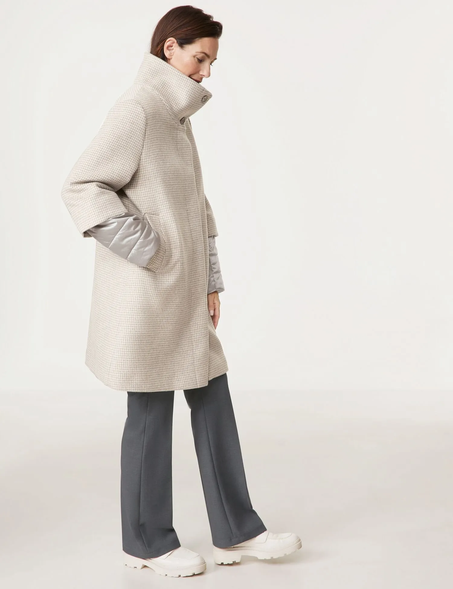 Short coat with fabric panelling